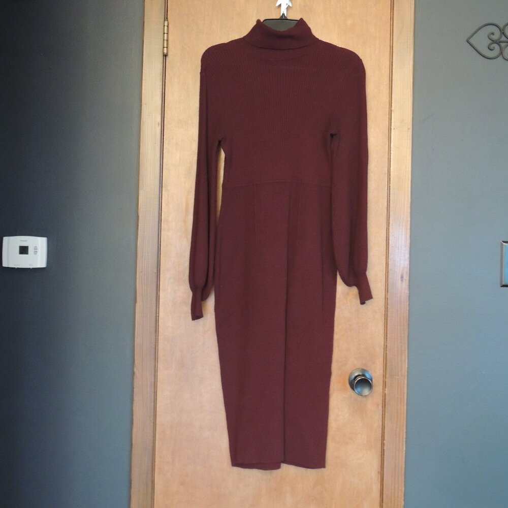 Stunning Gabrielle Union ribbed bodycon sweater dress in a bold red color. Featu